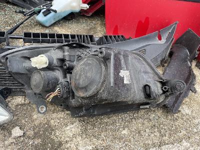 Přední světla Škoda Roomster rok 2008